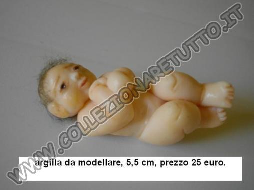 bambole miniature in argilla